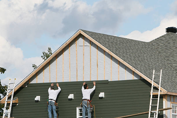 Professional Emergency Siding Repair technician working in South Vienna, OH